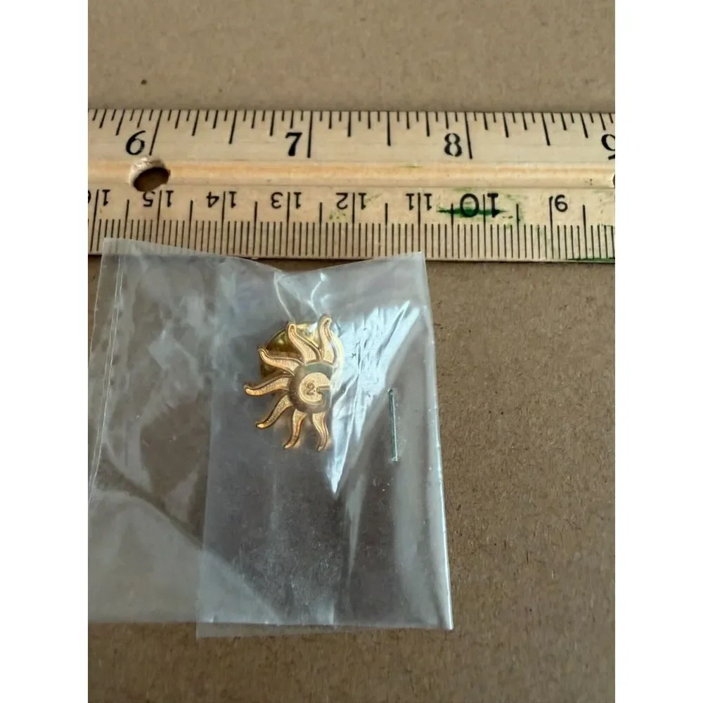 Gold metal sunburst design Pin with G2 lapel pin
